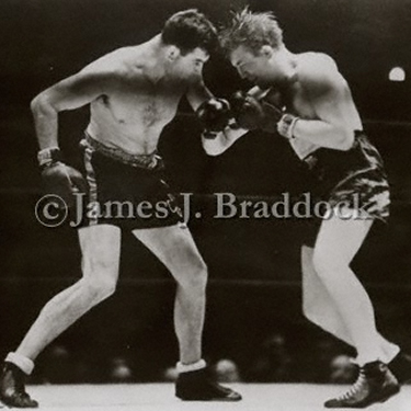 Braddock delivers a body blow to Tommy Farr