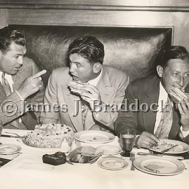 At Dempsey's restaurant NYC, Jack Dempey gives Jim advice for his upcoming fight with Max Baer