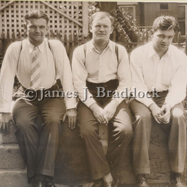 Jim Braddocks' brothers at their home in Guttenburg: Ralph, Joe Jr., and Al. 6/14/1935