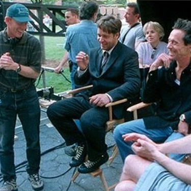 Director Ron Howard, Russell Crowe, and Producer Brian Graizer on the set of Cinerella Man. Toronto. 2004.